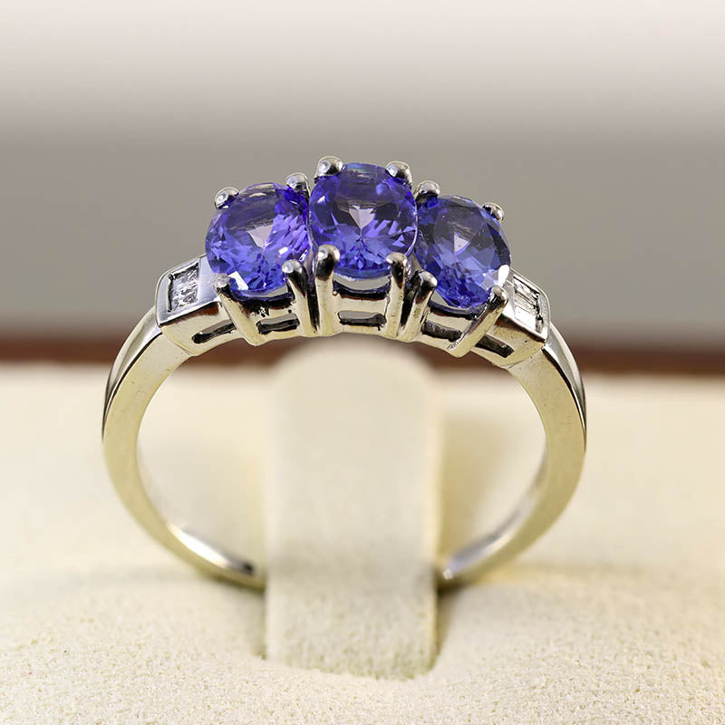 9Ct White Gold Tanzanite Ring With Diamond Shoulders