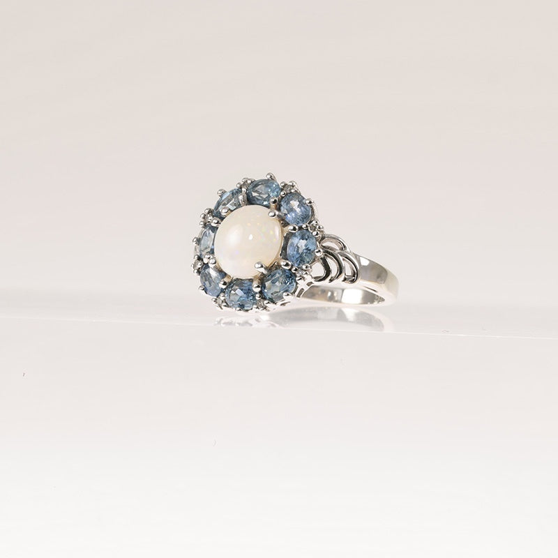 9Ct White Gold Opal & Sapphire Halo Ring — preloved 9ct white gold, opal | Sparklier Fine Jewellery