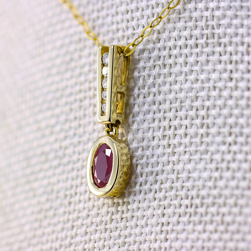 9Ct Gold Diamond And Ruby Pendant