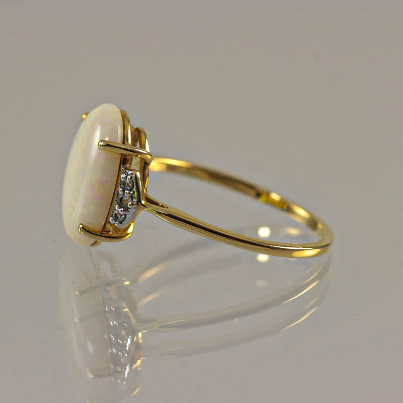 10Ct Gold Opal & White Sapphire Dress Ring — angled profile view of band