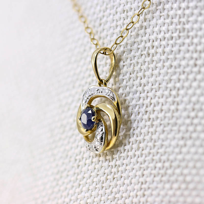 9Ct Gold Sapphire and White Gold Spiral Pendant