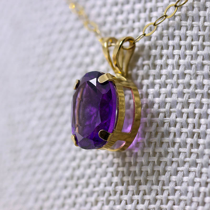 9Ct Gold Claw Set Amethyst Pendant