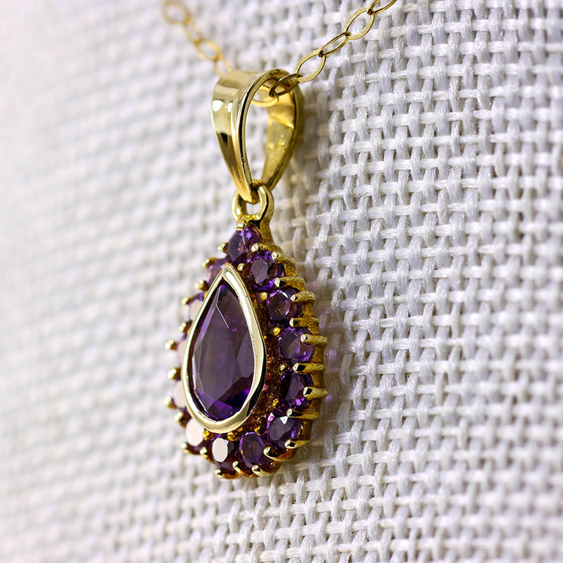 9Ct Gold Pear Shaped Amethyst Halo Pendant