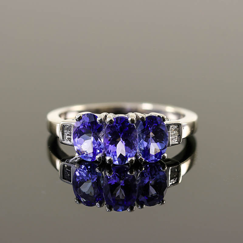 9Ct White Gold Tanzanite Ring With Diamond Shoulders