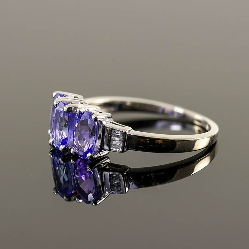 9Ct White Gold Tanzanite Ring With Diamond Shoulders