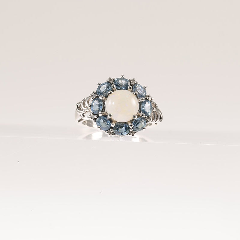 9Ct White Gold Opal & Sapphire Halo Ring — preloved 9ct white gold, opal | Sparklier Fine Jewellery