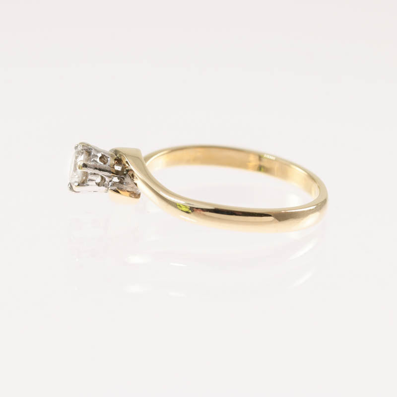 9Ct Gold Diamond 0.28Ct Solitaire Twist Ring — side profile showing crossover shoulders