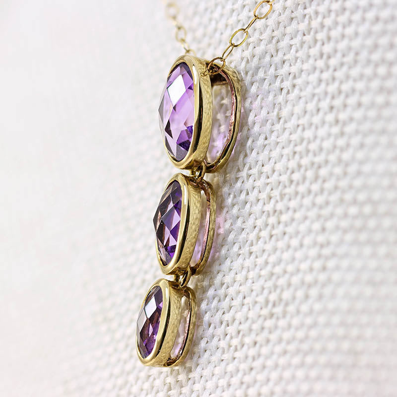 9Ct Gold Graduated Amethyst Drop Pendant