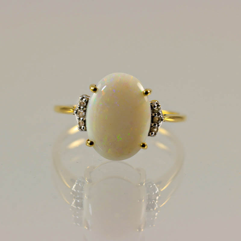10Ct Gold Opal & White Sapphire Dress Ring — front view of cabochon opal