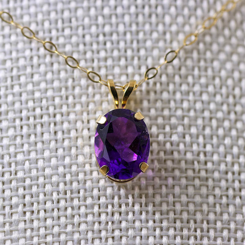 9Ct Gold Claw Set Amethyst Pendant