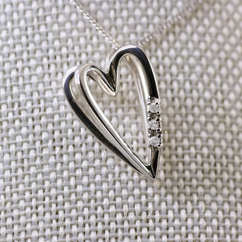 9Ct Gold Contemporary 3 Diamond Three Dimensional Heart Pendant