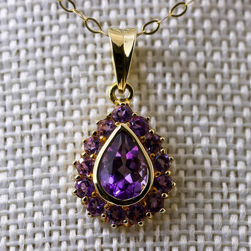 9Ct Gold Pear Shaped Amethyst Halo Pendant