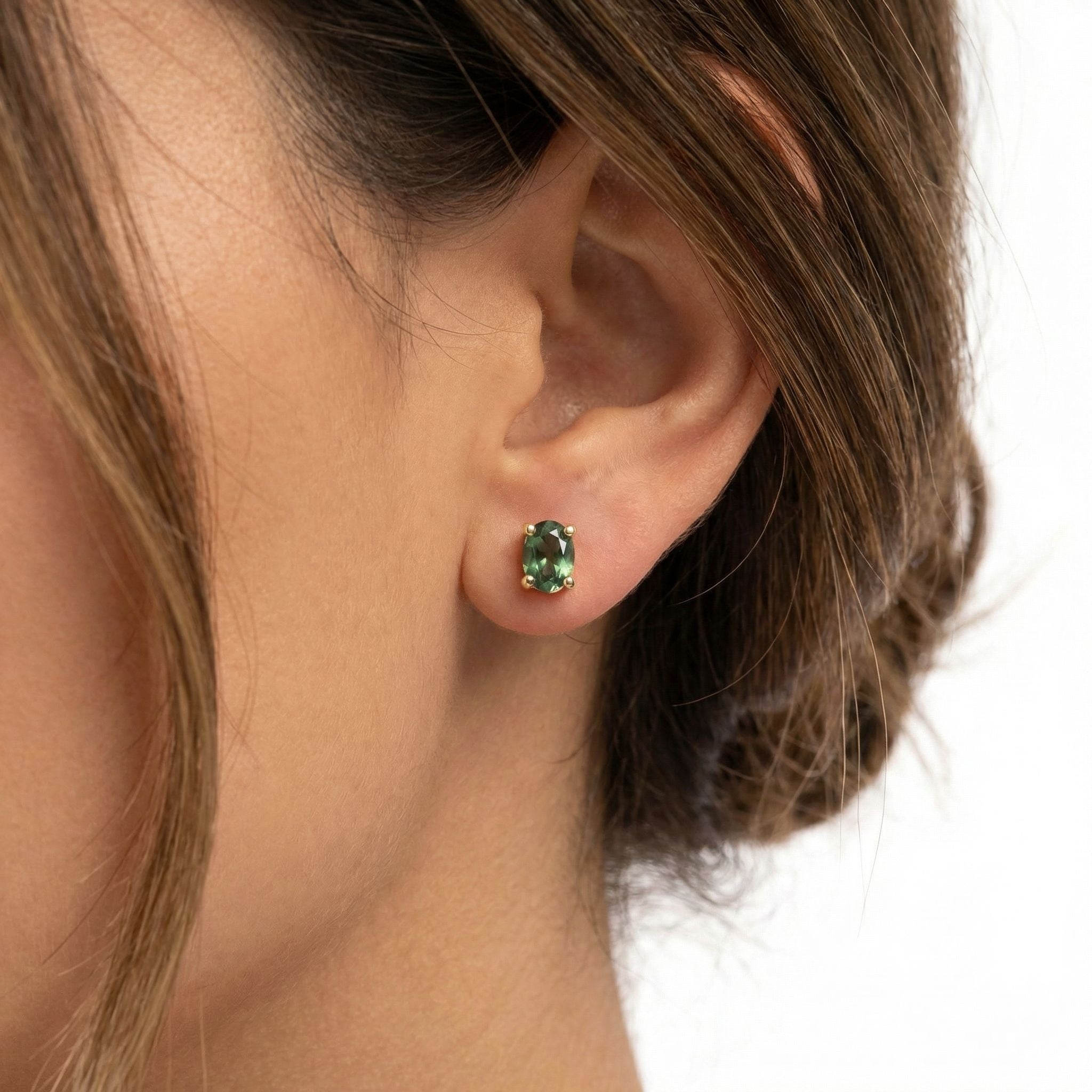 9Ct Gold Oval Cut Sapphire Stud Earrings