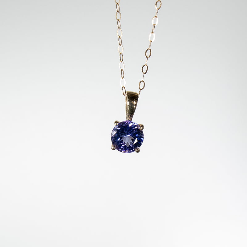 94-9ct-gold-tanzanite-1. 5ct-pendant