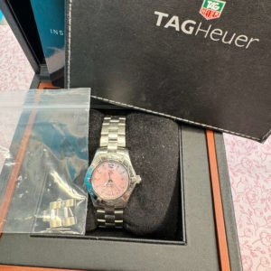 Tag Aquaracer ladies with pink mother of pearl dial, sitting in its box with paperwork