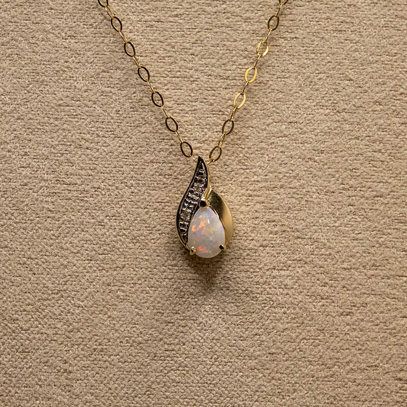 123-9ct-gold-pear-cut-opal-diamond-pendant