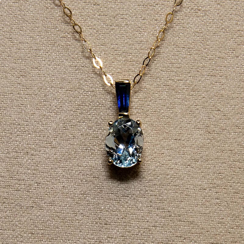 87-9ct-gold-claw-set-aquamarine--sapphire-pendant