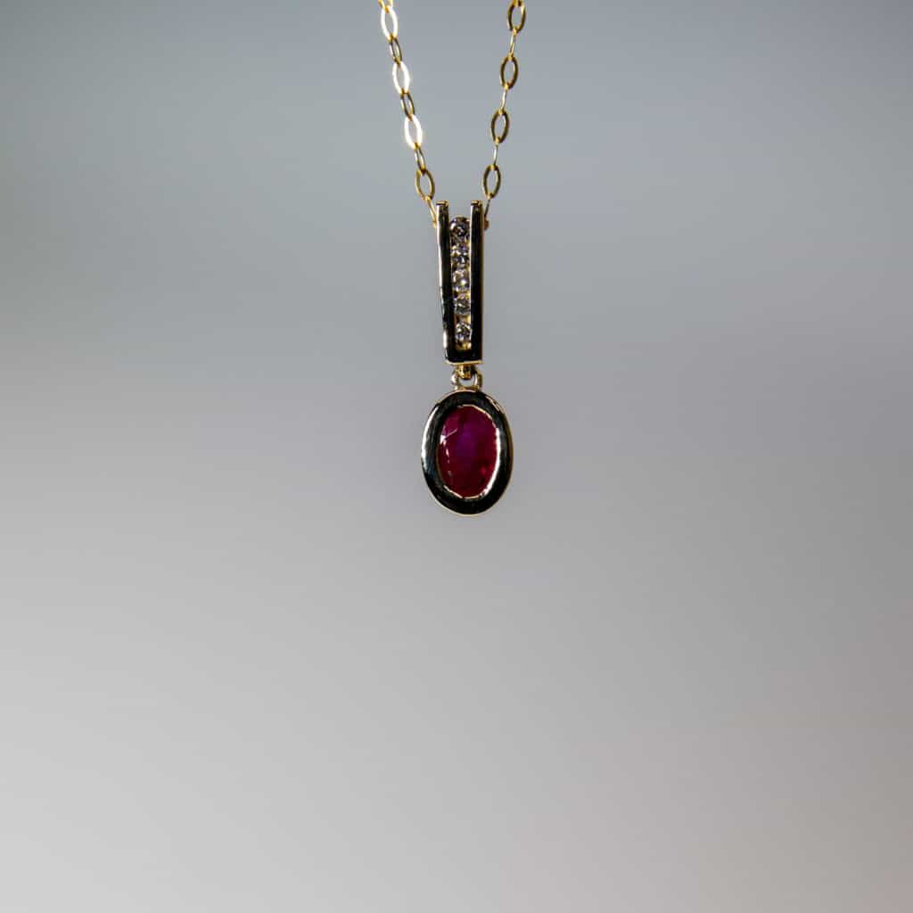 9Ct Gold Diamond And Ruby Pendant